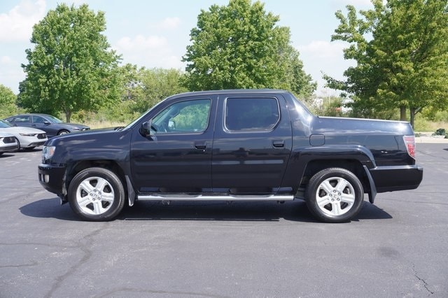 Used 2012 Honda Ridgeline RTL with VIN 5FPYK1F58CB452703 for sale in Grandville, MI