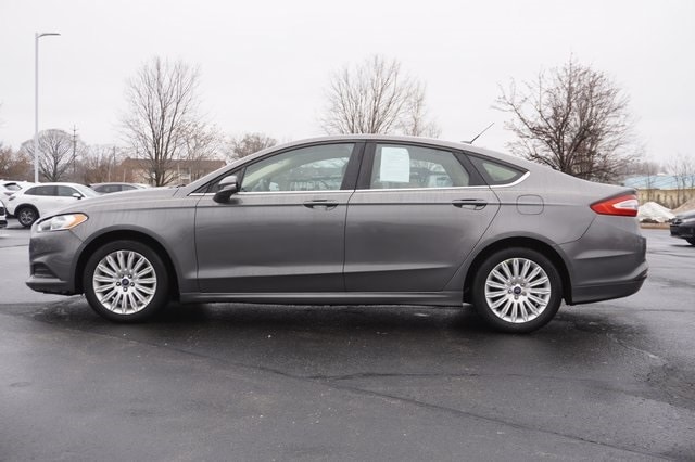 Used 2014 Ford Fusion SE Hybrid with VIN 3FA6P0LU3ER260023 for sale in Grandville, MI