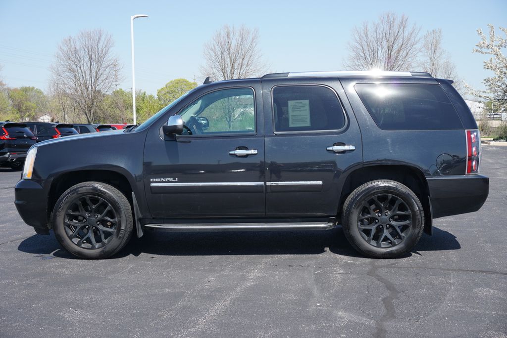 Used 2013 GMC Yukon Denali with VIN 1GKS2EEF6DR243296 for sale in Grandville, MI