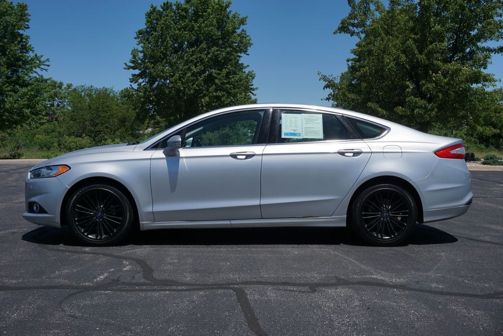 Used 2016 Ford Fusion SE with VIN 3FA6P0HDXGR142238 for sale in Grandville, MI