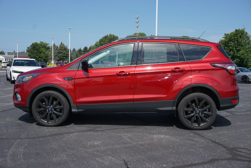 Used 2018 Ford Escape SE with VIN 1FMCU9GD6JUD57722 for sale in Grandville, MI