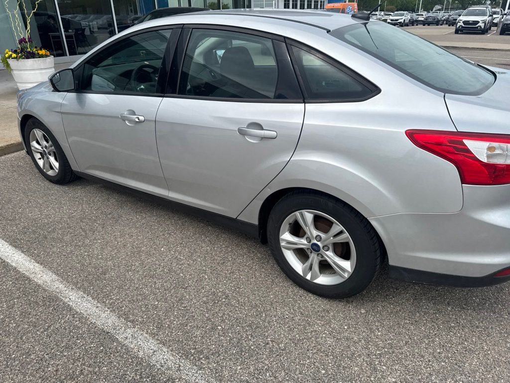 Used 2014 Ford Focus SE with VIN 1FADP3F29EL348012 for sale in Grandville, MI