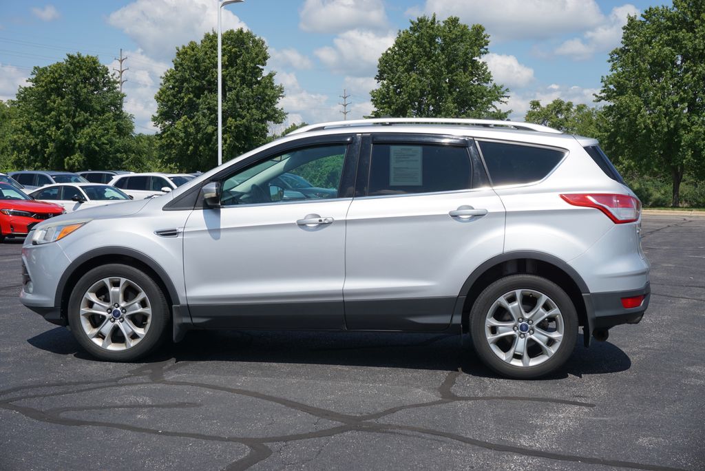 Used 2014 Ford Escape Titanium with VIN 1FMCU0J96EUB24798 for sale in Grandville, MI