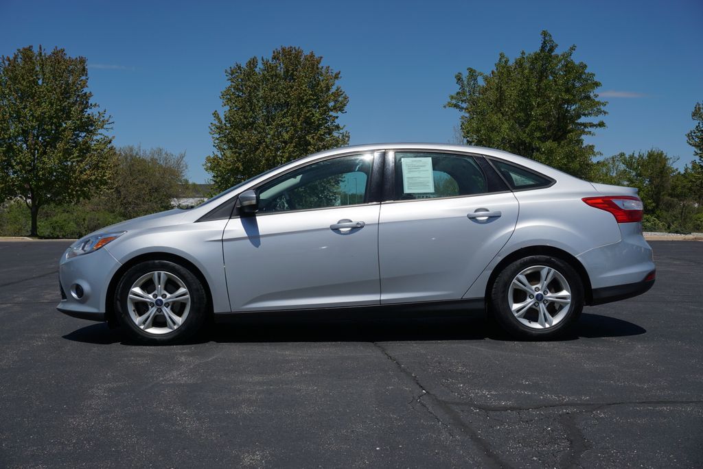 Used 2014 Ford Focus SE with VIN 1FADP3F29EL348012 for sale in Grandville, MI