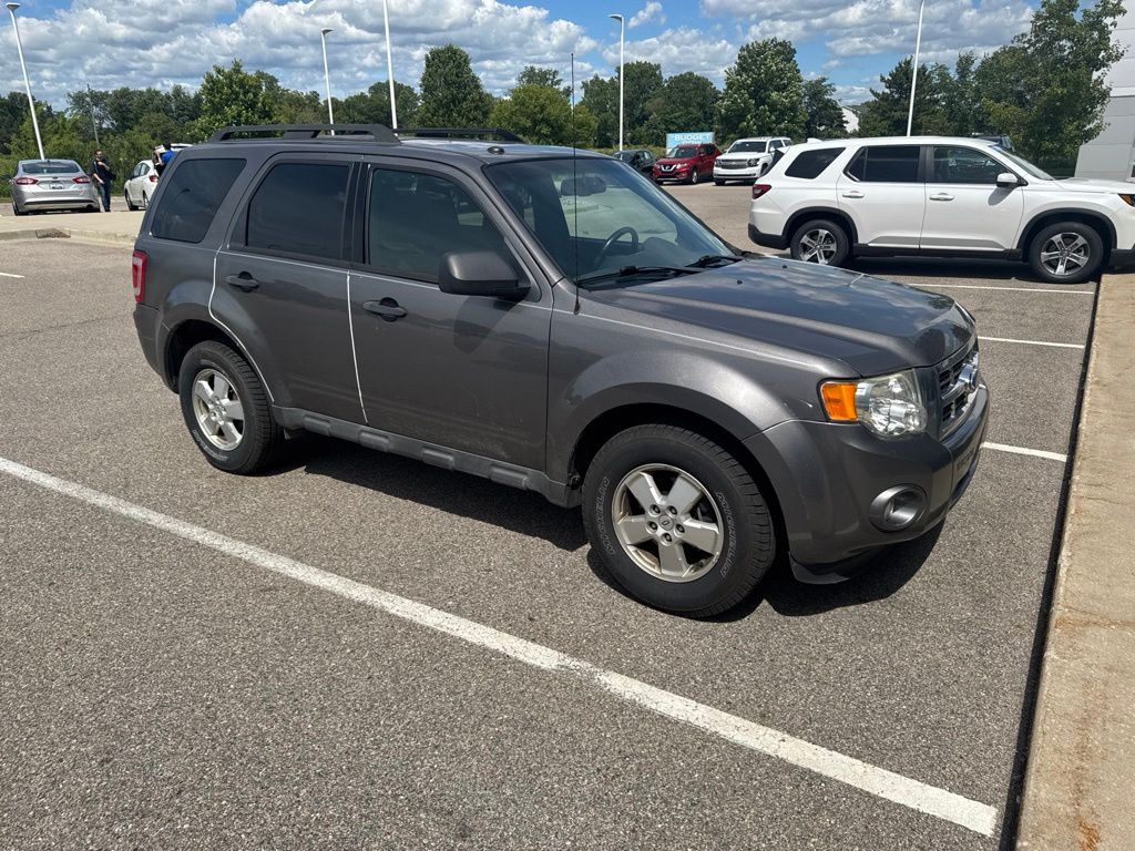 Used 2011 Ford Escape XLT with VIN 1FMCU9DG8BKC37321 for sale in Grandville, MI