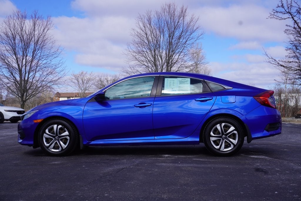 Used 2017 Honda Civic LX with VIN 2HGFC2F56HH529915 for sale in Grandville, MI