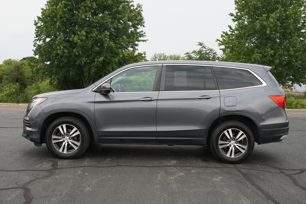 Used 2016 Honda Pilot EX-L with VIN 5FNYF6H57GB098704 for sale in Grandville, MI