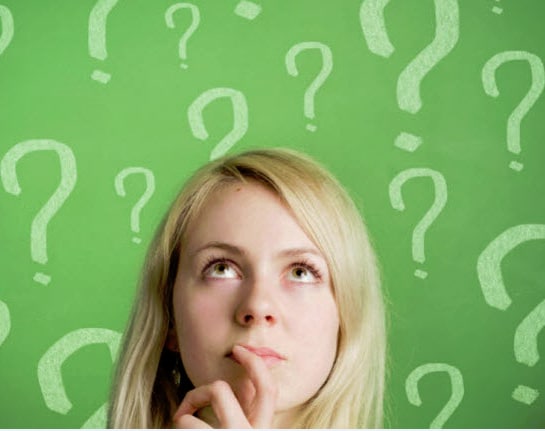 woman thinking about used cars