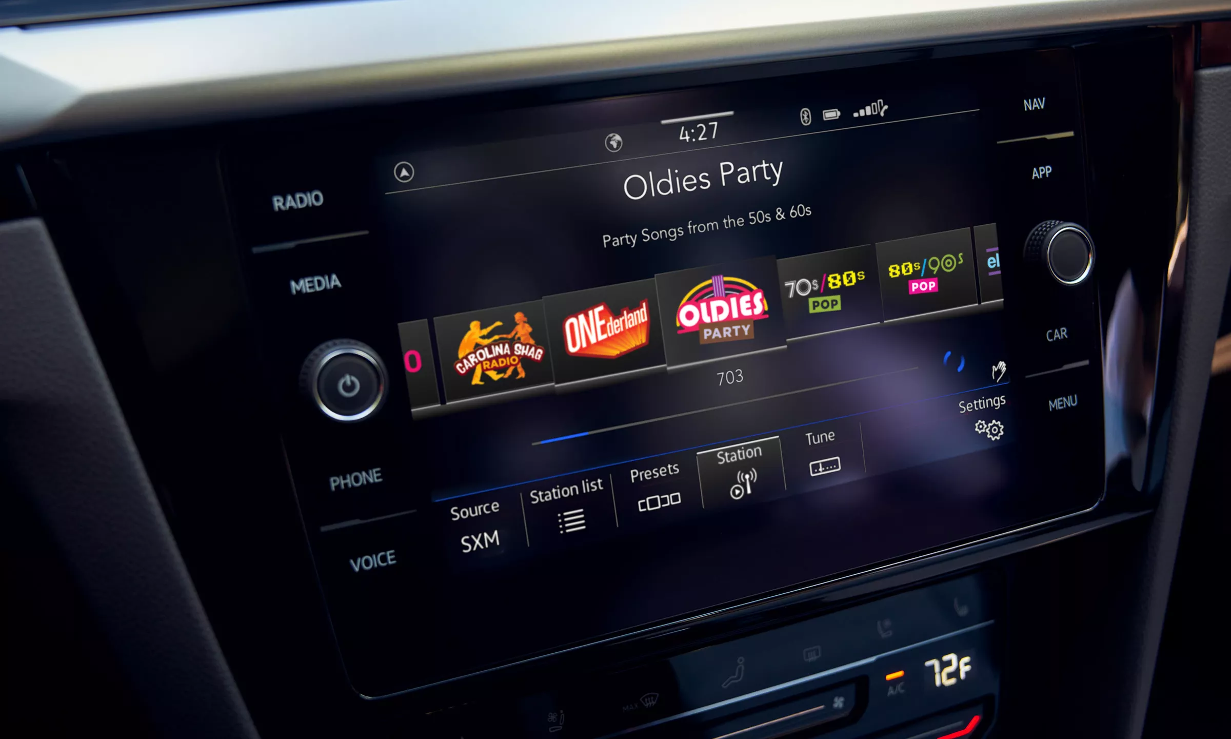 Close up of the 8 Discover Media touchscreen displaying the SiriusXM with 360L screen and the Oldies Party station is selected.