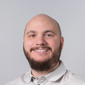 Staff member Adam Elliot from ID_4b2c8d