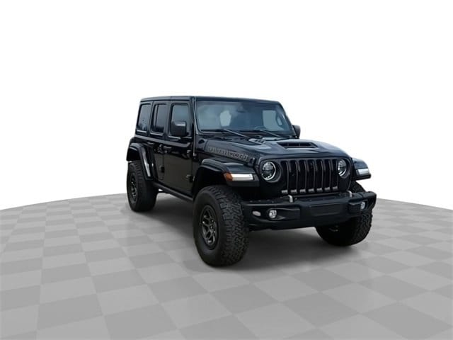 Used 2023 Jeep Wrangler 4-Door Rubicon with VIN 1C4JJXSJ9PW626623 for sale in Lansing, MI