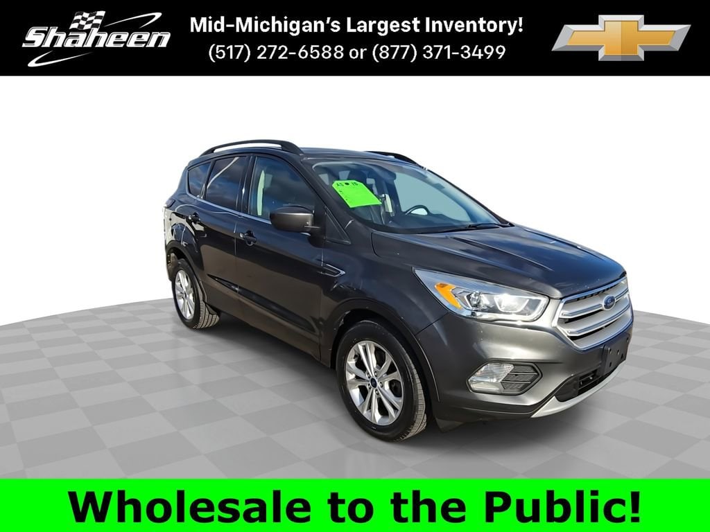 Used 2018 Ford Escape SEL with VIN 1FMCU9HD5JUB18077 for sale in Lansing, MI
