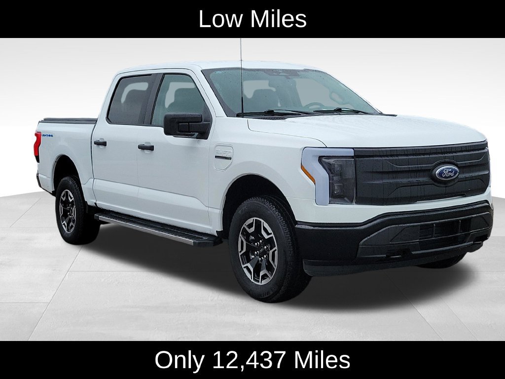 Used 2023 Ford F-150 Lightning Pro with VIN 1FTVW1ELXPWG39734 for sale in Lansing, MI