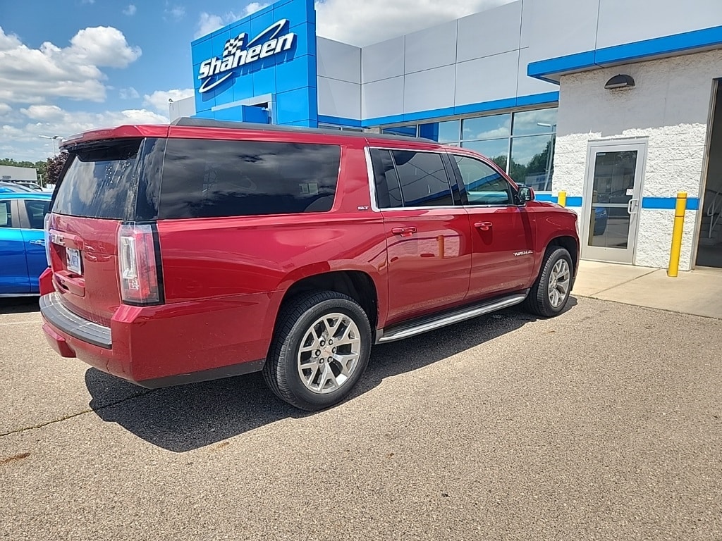 Used 2015 GMC Yukon XL SLT with VIN 1GKS2HKC6FR554077 for sale in Lansing, MI