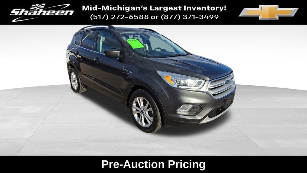 Used 2018 Ford Escape SEL with VIN 1FMCU9HD5JUB18077 for sale in Lansing, MI