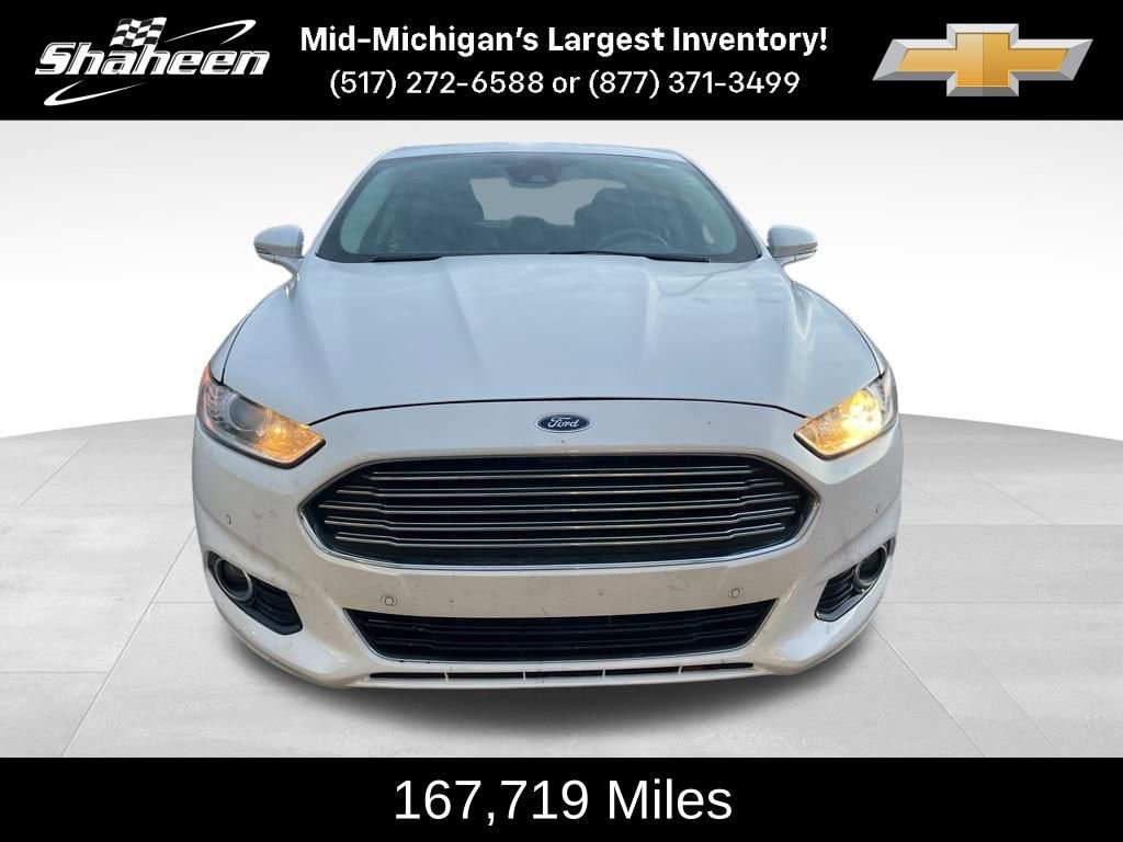 Used 2015 Ford Fusion Hybrid Titanium with VIN 3FA6P0RU6FR181454 for sale in Lansing, MI