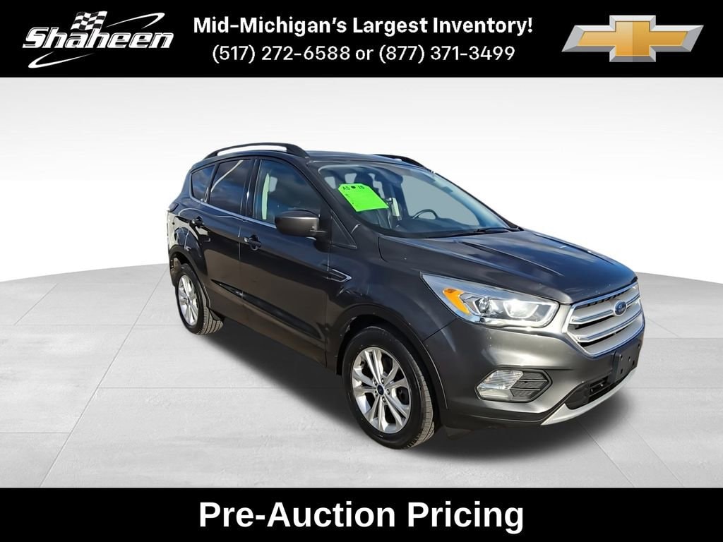 Used 2018 Ford Escape SEL with VIN 1FMCU9HD5JUB18077 for sale in Lansing, MI
