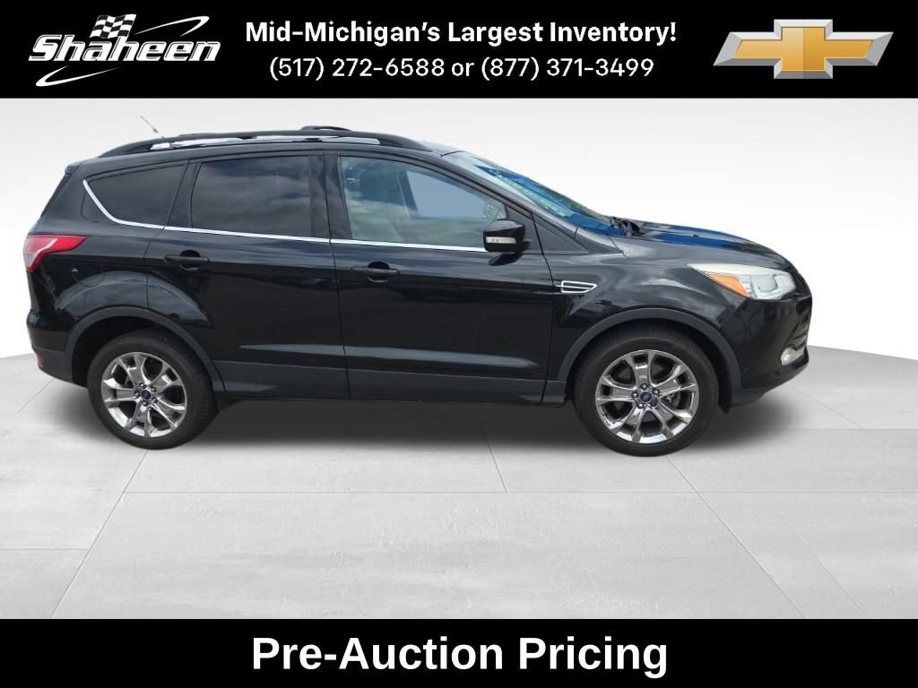 Used 2013 Ford Escape SEL with VIN 1FMCU9HX5DUB81291 for sale in Lansing, MI