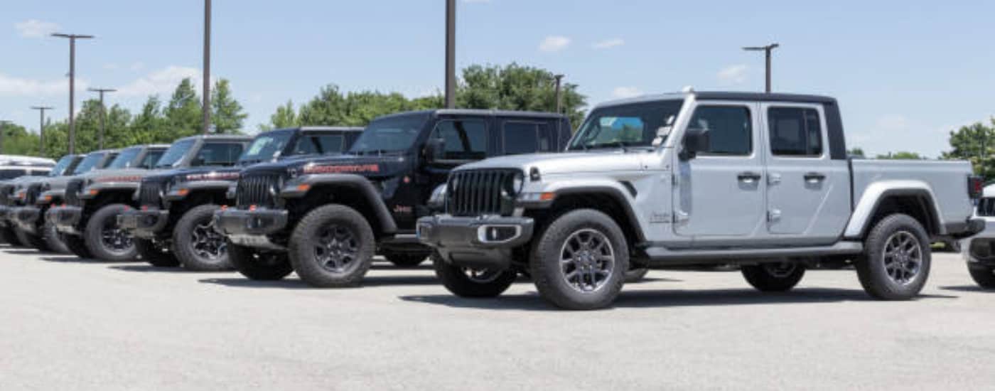 A row of Jepps lined up outside of a dealership
