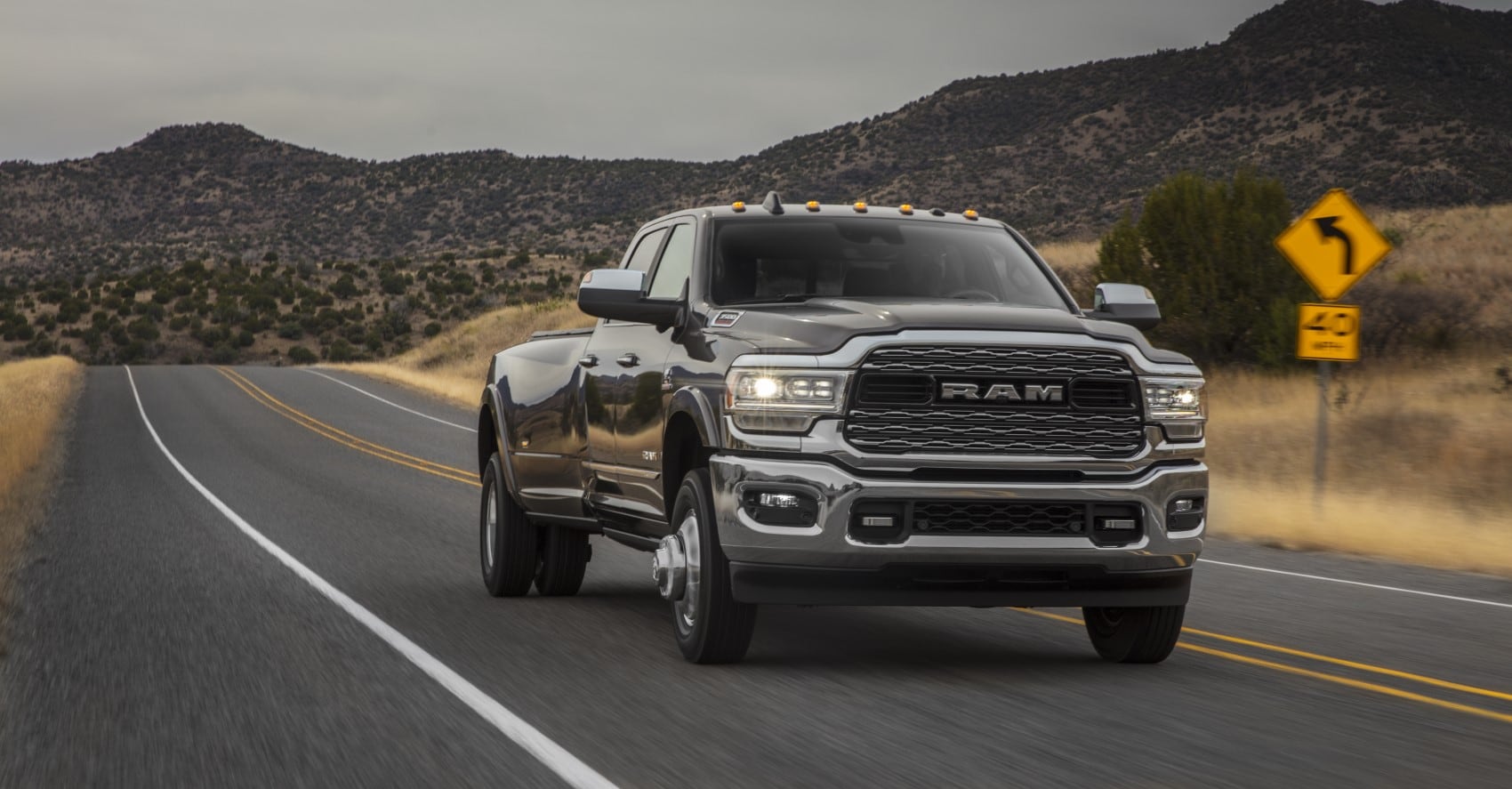 Ram 3500 truck driving along scenic road