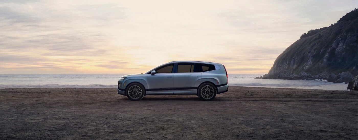 Silver 2026 Hyundai IONIQ 9 Calligraphy Design parked on a shore