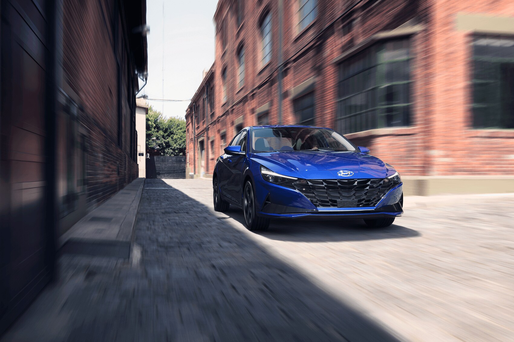 Hyundai Elantra driving through the city - Used Car Dealer near Plymouth CT