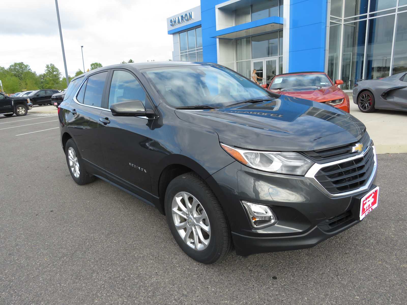 Used 2021 Chevrolet Equinox LT with VIN 2GNAXUEV0M6124186 for sale in Liverpool, NY