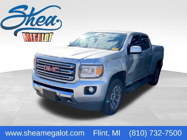 Used 2015 GMC Canyon SLE with VIN 1GTG6BE38F1184487 for sale in Flint Township, MI