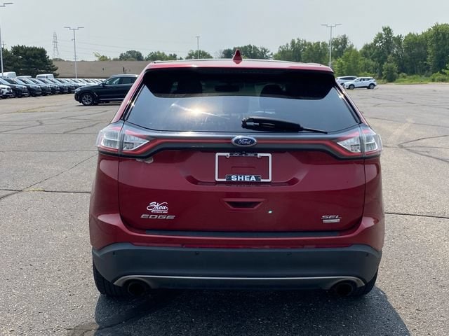 Used 2016 Ford Edge SEL with VIN 2FMPK3J91GBC27242 for sale in Flint Township, MI