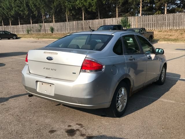 Used 2010 Ford Focus SE with VIN 1FAHP3FN7AW155846 for sale in Flint Township, MI