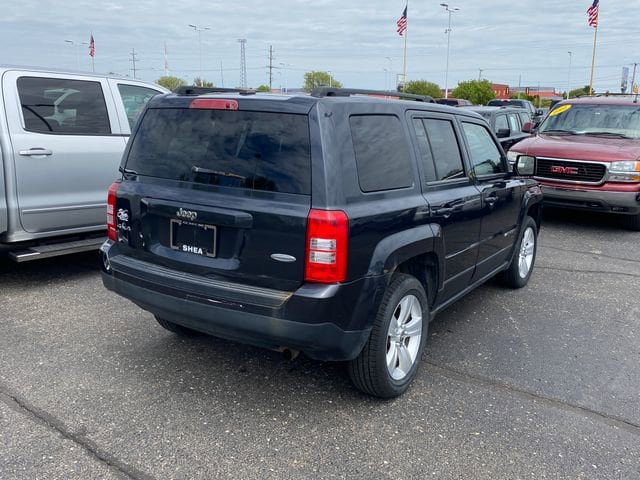 Used 2014 Jeep Patriot Latitude with VIN 1C4NJRFB6ED910946 for sale in Flint Township, MI