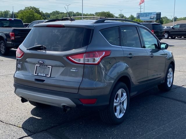 Used 2013 Ford Escape SE with VIN 1FMCU9GX0DUB63007 for sale in Flint, MI