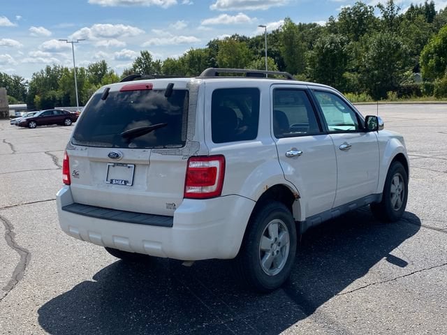 Used 2010 Ford Escape XLT with VIN 1FMCU0D75AKA63475 for sale in Flint Township, MI