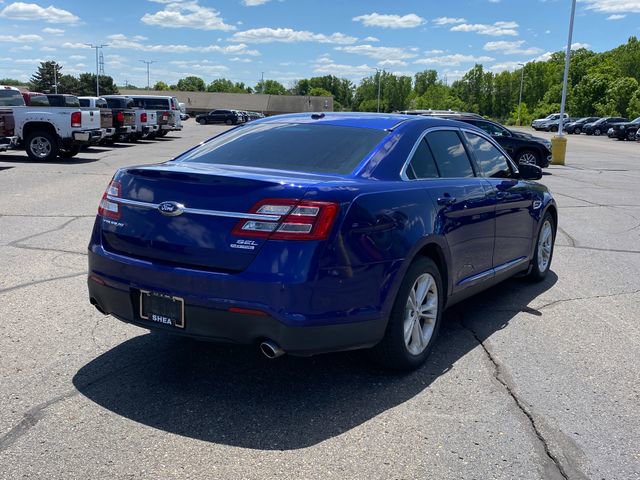 Used 2015 Ford Taurus SEL with VIN 1FAHP2E8XFG153662 for sale in Flint Township, MI