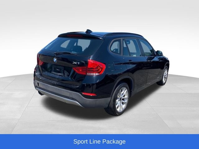 Used 2015 BMW X1 28i with VIN WBAVL1C53FVY28529 for sale in Flint Township, MI