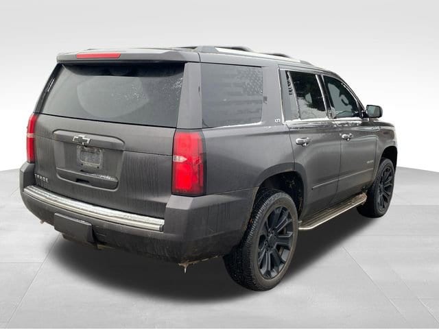 Used 2015 Chevrolet Tahoe LTZ with VIN 1GNSKCKC6FR723925 for sale in Flint Township, MI