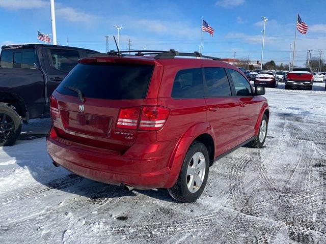 Used 2010 Dodge Journey SXT with VIN 3D4PG5FV3AT167633 for sale in Flint Township, MI