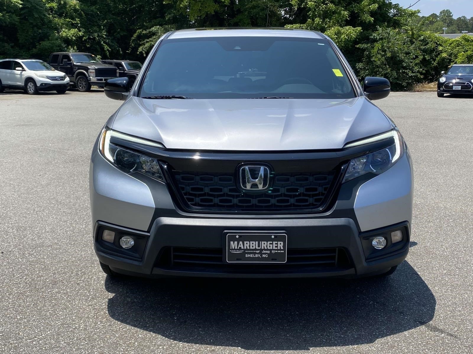 Used 2021 Honda Passport EX-L with VIN 5FNYF8H57MB027204 for sale in Shelby, NC