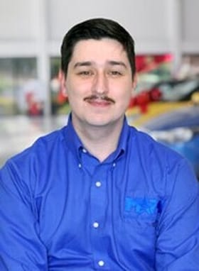 Staff member Matthew Fonseca from ID_773378