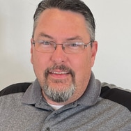 Staff member MIKE CAVINDER from 0aa43a999254