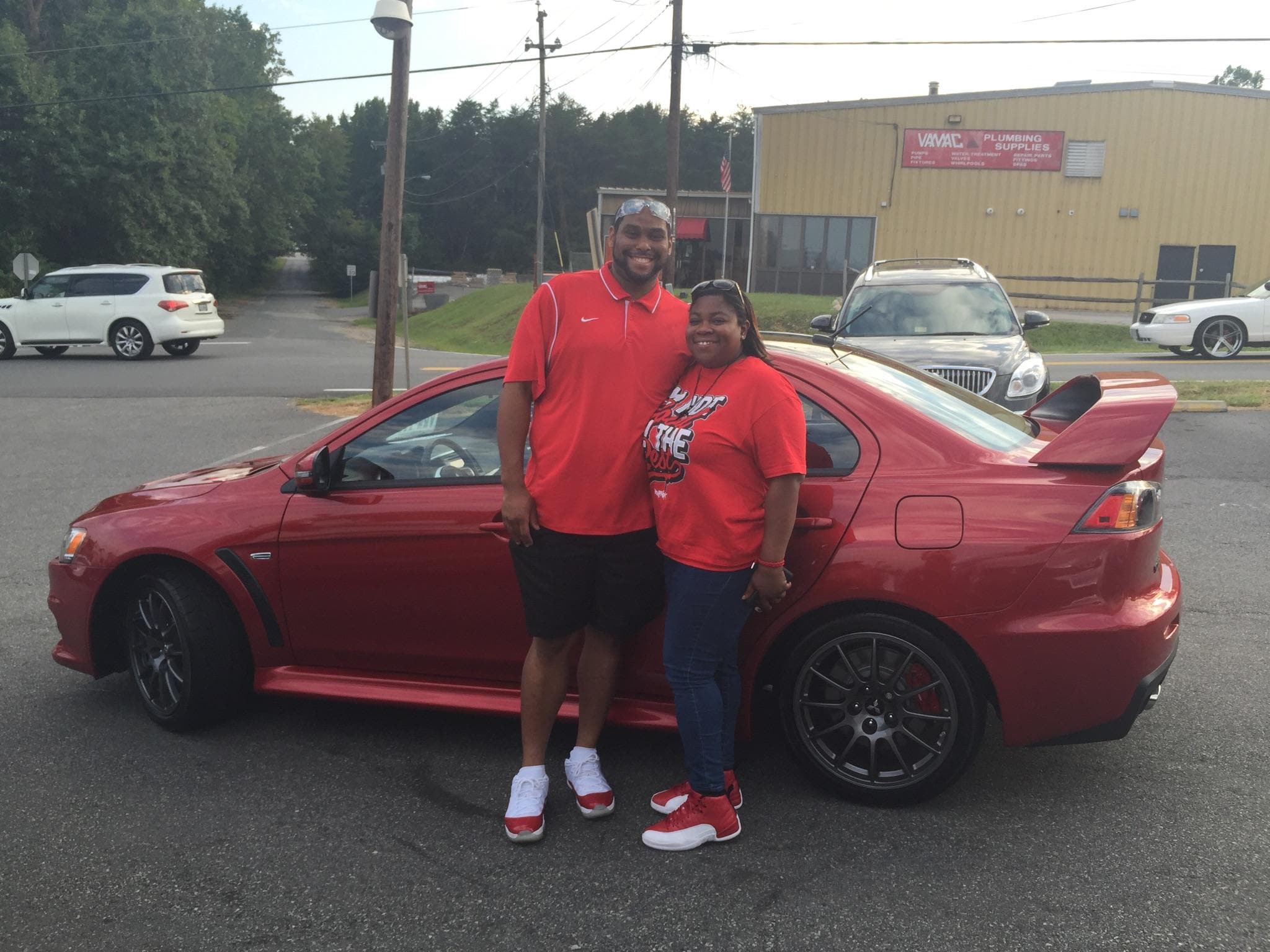 With help from Dawn DeChristopher, Happy Customers Stephen and Sharonda Posey bought the LAST Final 
Edition Lancer EVO on the lot and a 2014 Buick Enclave!