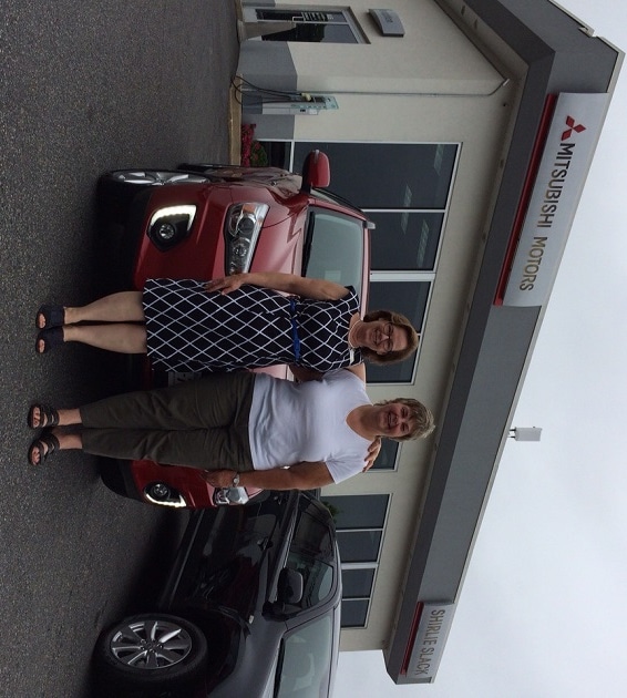 Patty Slack and Donna Windsor with Donna's new 2015 Outlander Sport.