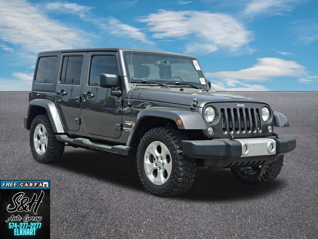 Used 2014 Jeep Wrangler Unlimited Sahara SUV
