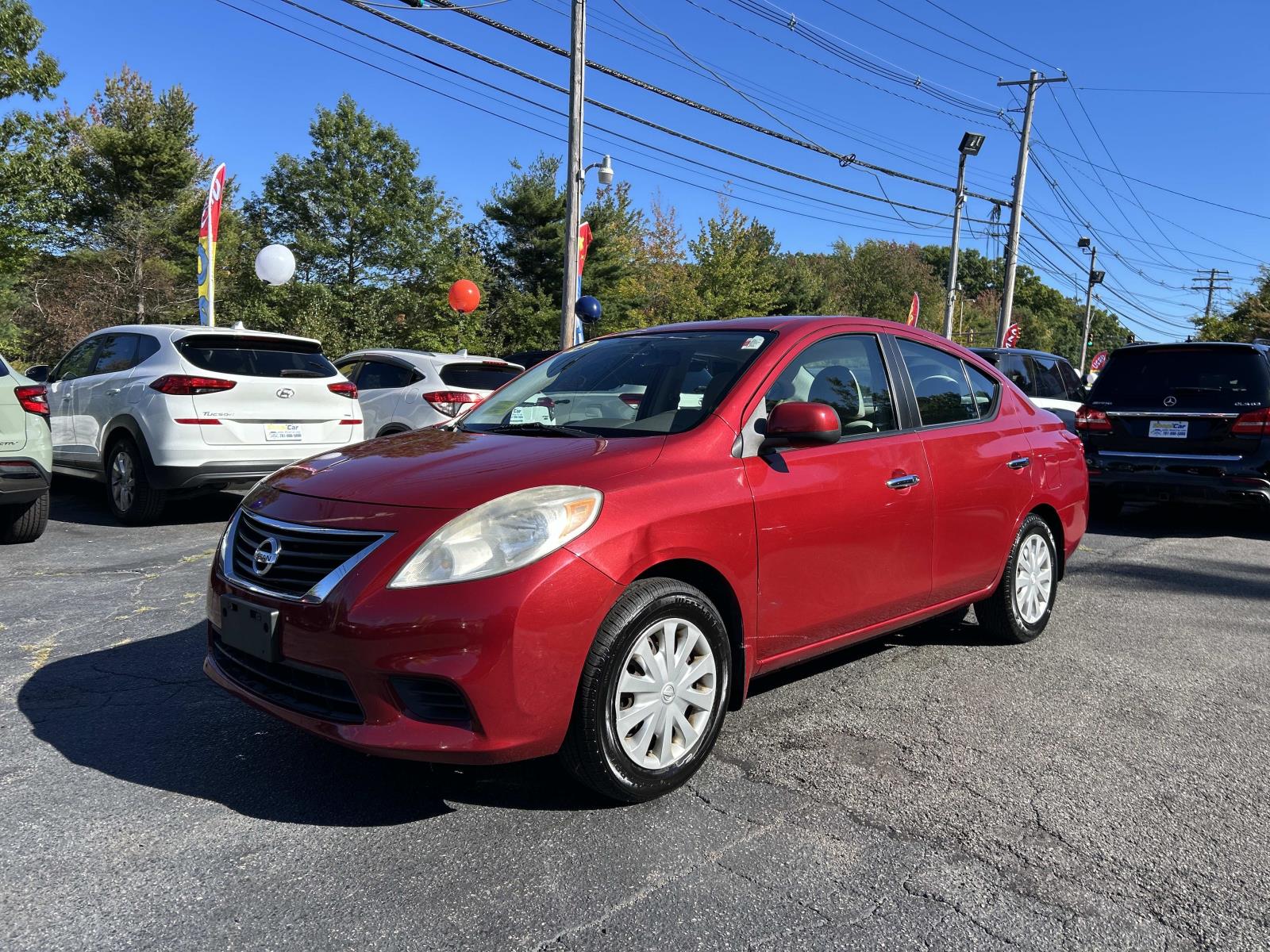 Red Brick 2012 Nissan Versa Sedan Front-Wheel Drive Continuously Variable Transmission