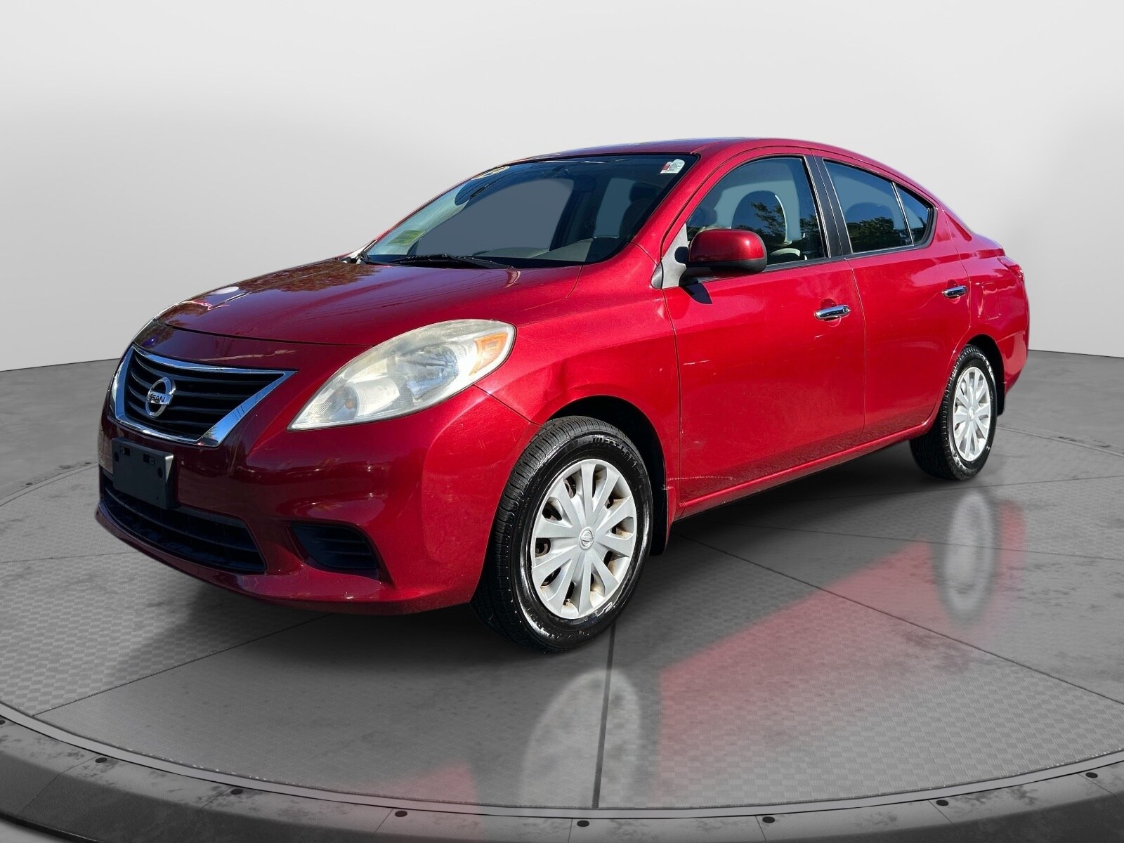 Red Brick 2012 Nissan Versa Sedan Front-Wheel Drive Continuously Variable Transmission