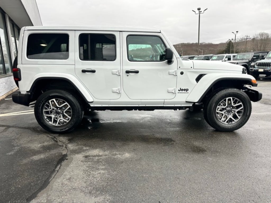 New 2025 Jeep Wrangler 4-DOOR SAHARA Sport Utility