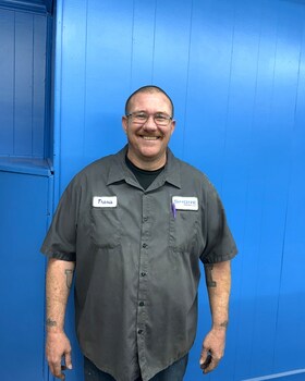 Staff member Travis from ID_d032ec