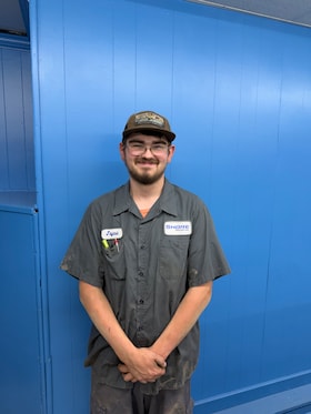 Staff member Jaycub "Smiley" Farrar from ID_d6e78cd94840