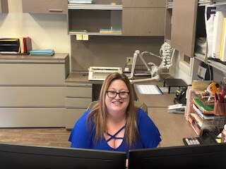 Staff member Nicole from ID_9f6508