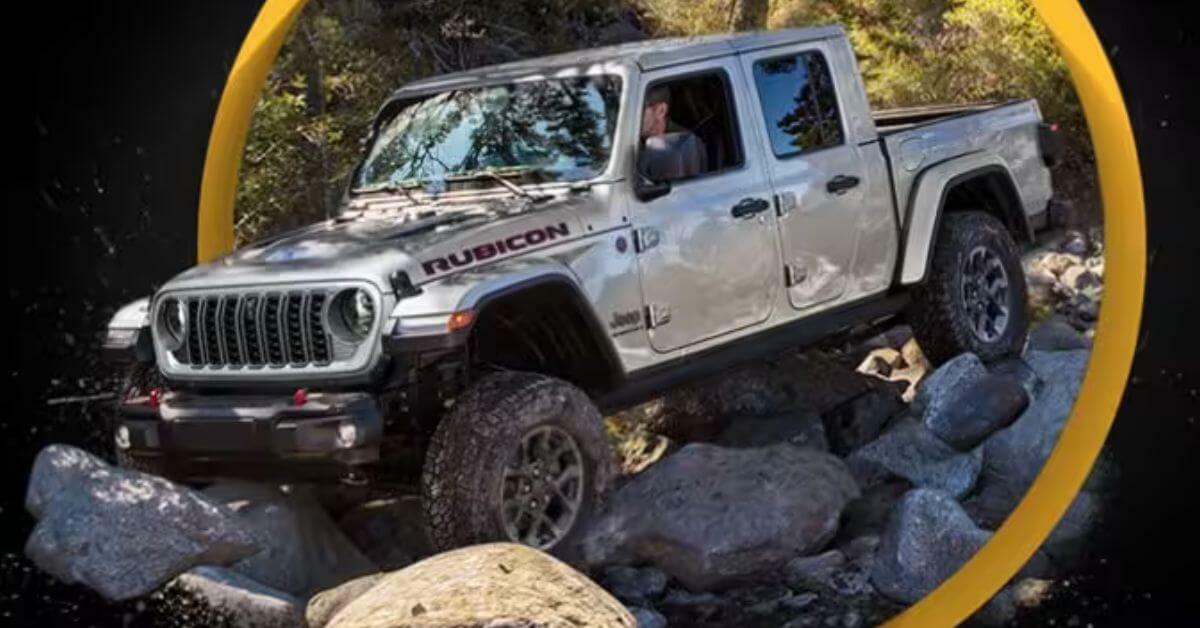 Gray 2024 Jeep Gladiator Climbing Over Large Rocks | Sierra Blanca Motors | Ruidoso, NM